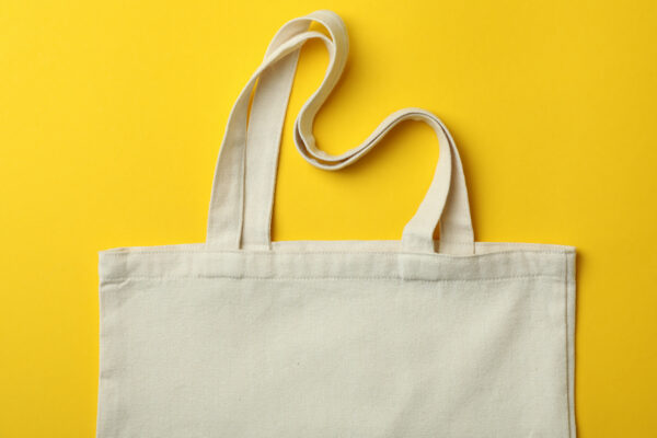 Blank Eco Bag On Yellow Background, Space For Text