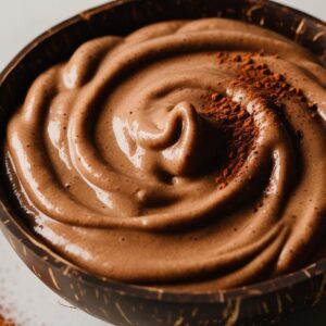 Nut Butter Chocolate Smoothie In A Coconut Bowl