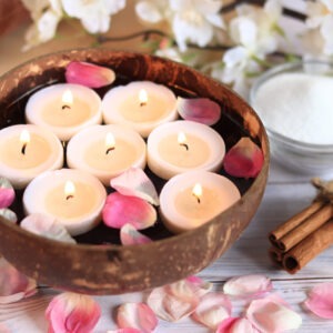 Burning Candles In Water. Spa Composition. Coconut Bowl With Can