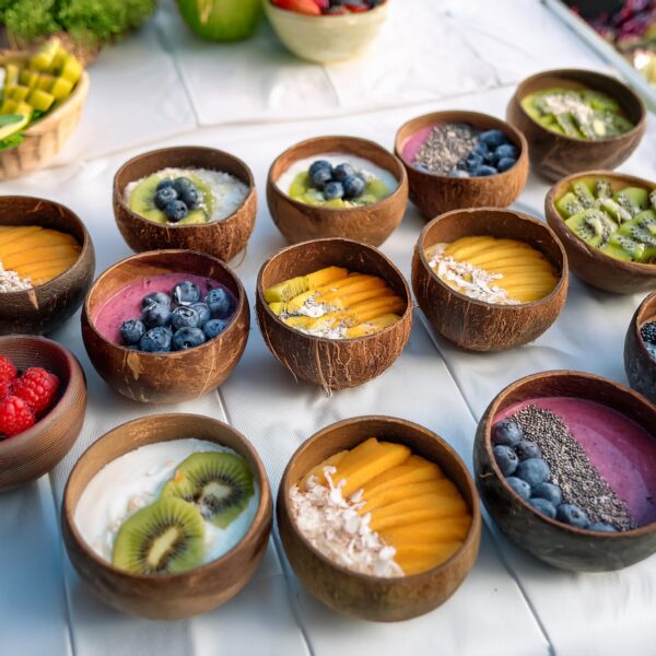 Smoothie Bowls Served In Coconut Bowls